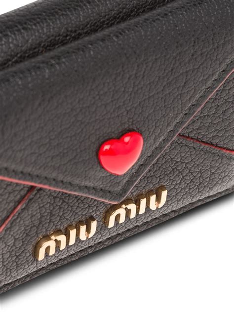 miu miu heart wallet|farfetch miu miou wallet.